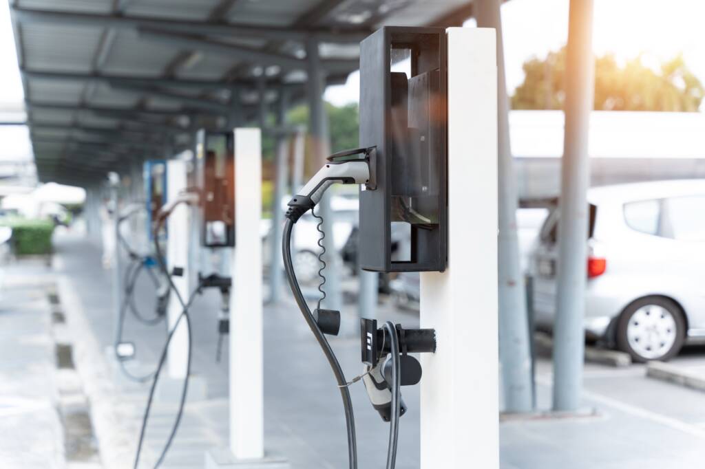 Electric car on electric car charging station. Power supply for electric car charging.